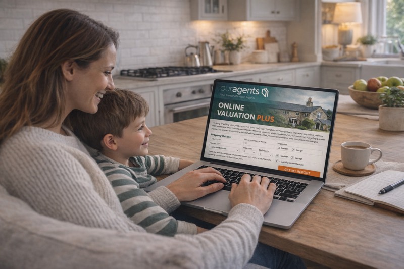Mother and son at a kitchen table requesting an Our Agents Online Valuation Plus report on a laptop